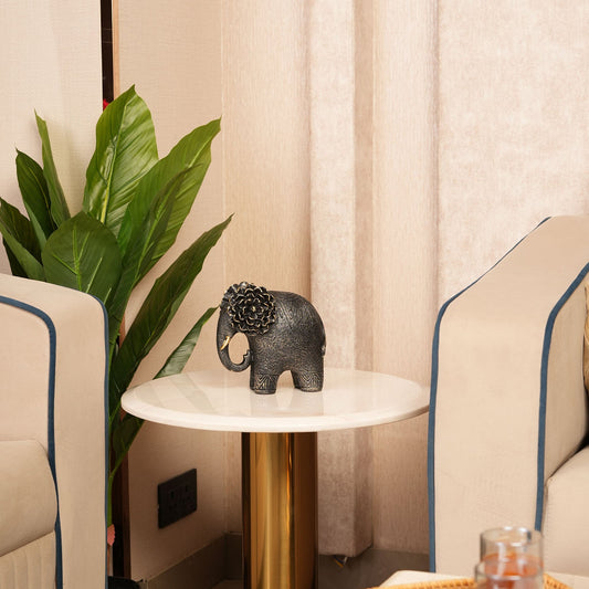 Textured Elephant Sculpture with Flower Headpiece